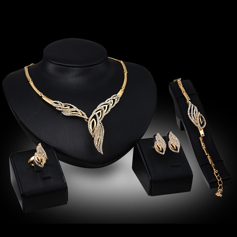 Statement Bridal Jewelry Set: Necklace, Earrings, Ring, and Bracelet (Four-Piece Set) for Women's Fashion