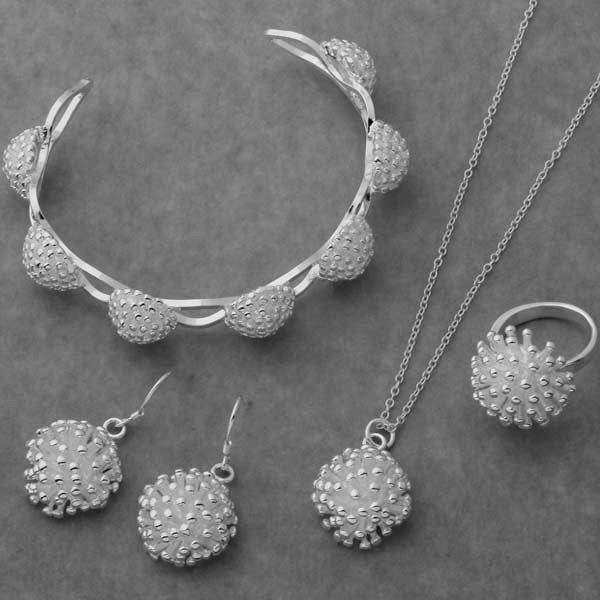 Four-Piece Jewelry Set: Bracelet, Pendant, Necklace, Ring, and Earrings