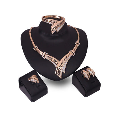Four-Piece Earring, Necklace, and Bracelet Set