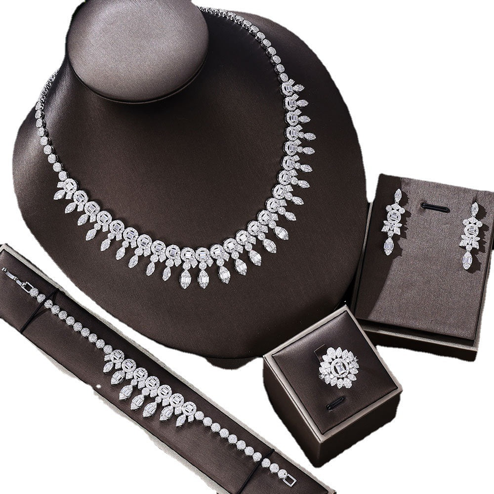Four-Piece Set: Necklace, Bracelet, Ring, and Earring